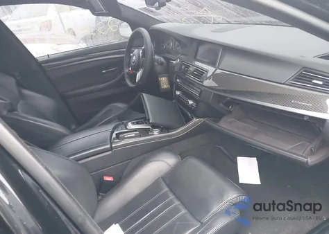 2015 BMW M5 z USA, uszkodzony, nr VIN WBSFV9C52FD595287